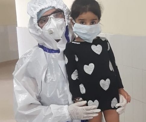 Mother’s day: brave heart mother tending her corona positive 2 years daughter donning complete PPE kit